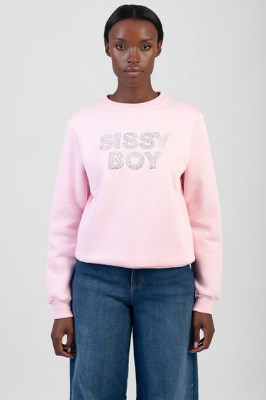 pink crew neck sweatshirt with silver rhinestone lettering that reads sissy boy, model in blue jeans