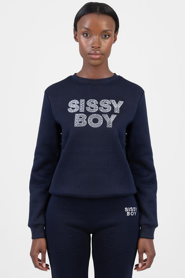 woman in navy blue sweatshirt by Blue Jean Traders with rhinestone sissy boy lettering on chest, paired with matching joggers