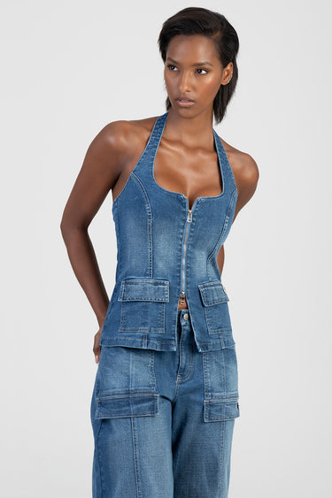 blue denim halter top with front zipper and patch pockets from blue jean traders, worn with matching cargo jeans on a model