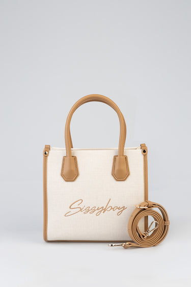beige canvas bag with tan leather accents and handles, sissyboy logo on front, comes with a detachable tan strap