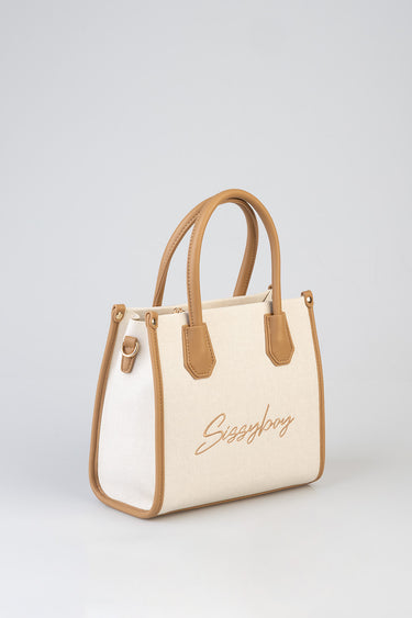Blue Jean Traders willow bag in beige canvas with tan leather trim and handles