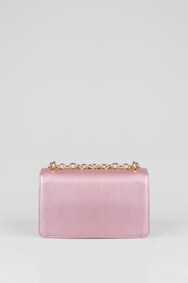 pink metallic clutch bag with a gold chain strap across the top