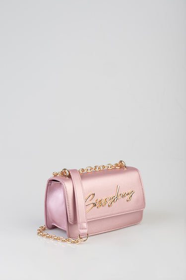 pink metallic mini bag with gold chain strap and cursive logo on front