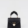black bag with gold heart lock and gathered strap handle