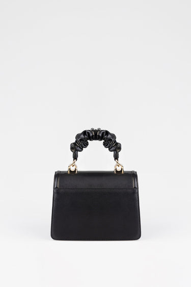 black leather handbag with a gathered ruched handle and gold hardware by Blue Jean Traders