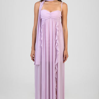 woman in lavender maxi dress with ruched bust, halter straps and long scarf around neck, cascading ruffle details along front